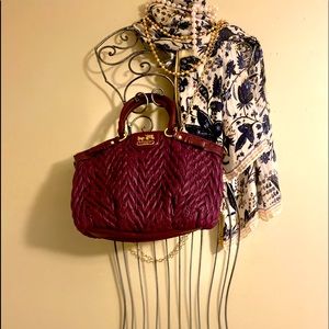 Medium purple Coach purse